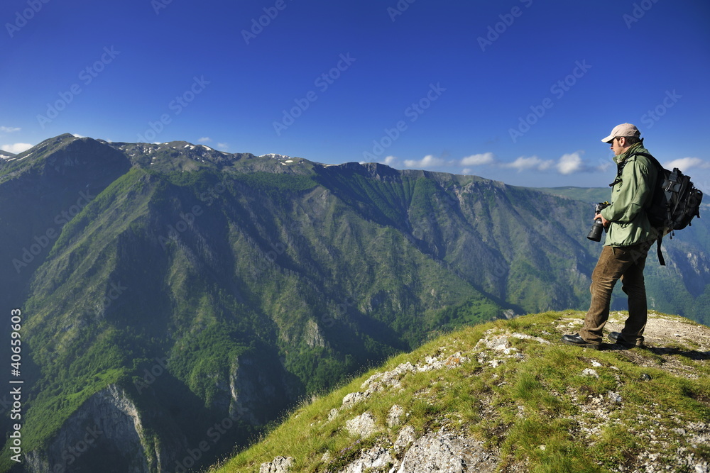 Nature photographer with digital camera