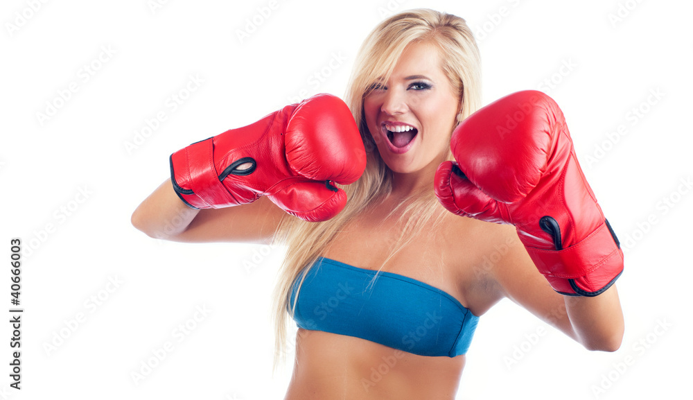 Photo of young wonderful woman wearing boxing glove Photo of young wonderful woman wearing boxing glove