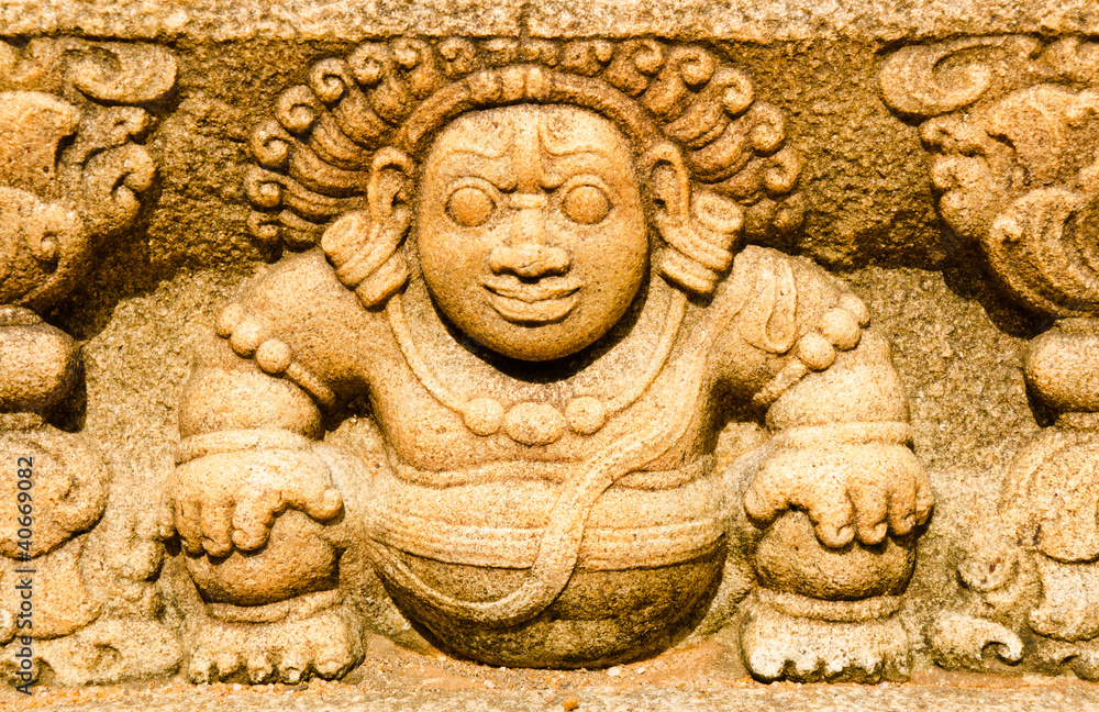 Fototapeta premium stone statues that support the arch of steps, leading to a holy