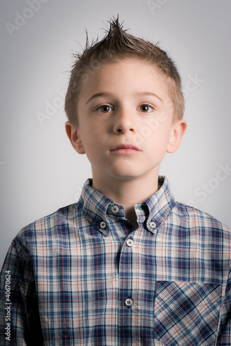 Plakat impassive boy