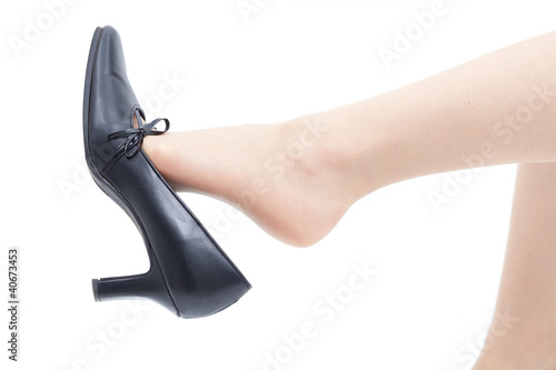 女性の足と靴