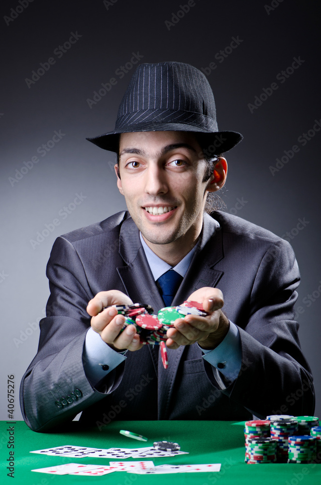 Casino player playing with chips Casino player playing with chips