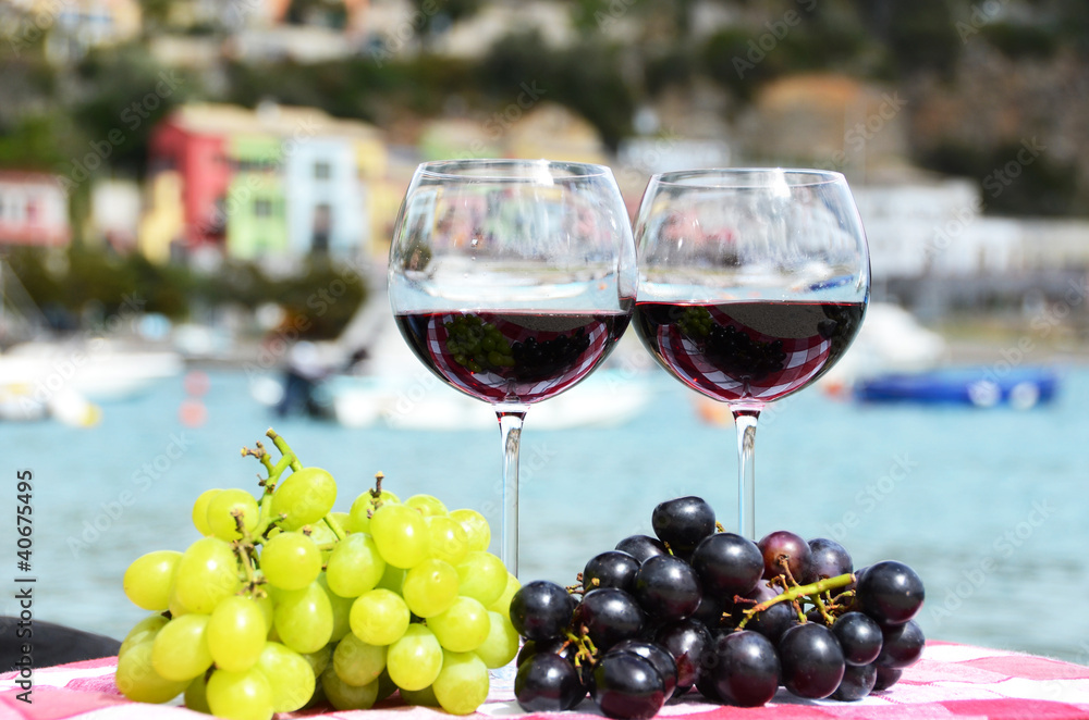 Pair of wineglasses and grapes. Portvenere, Italy Pair of wineglasses and grapes. Portvenere, Italy
