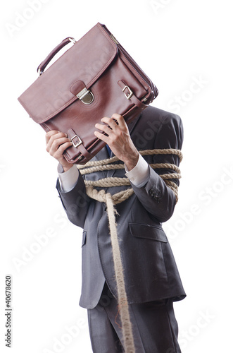 Businessman tied with rope