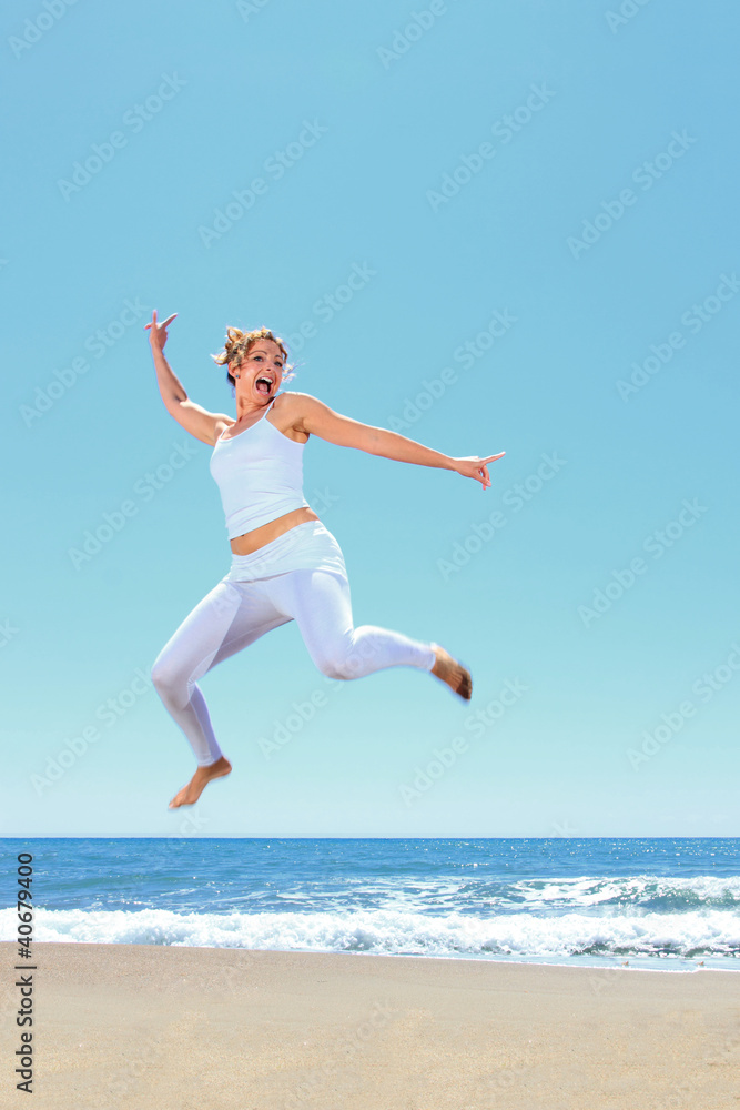 young beautiful woman jumping