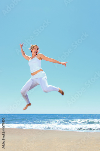 young beautiful woman jumping