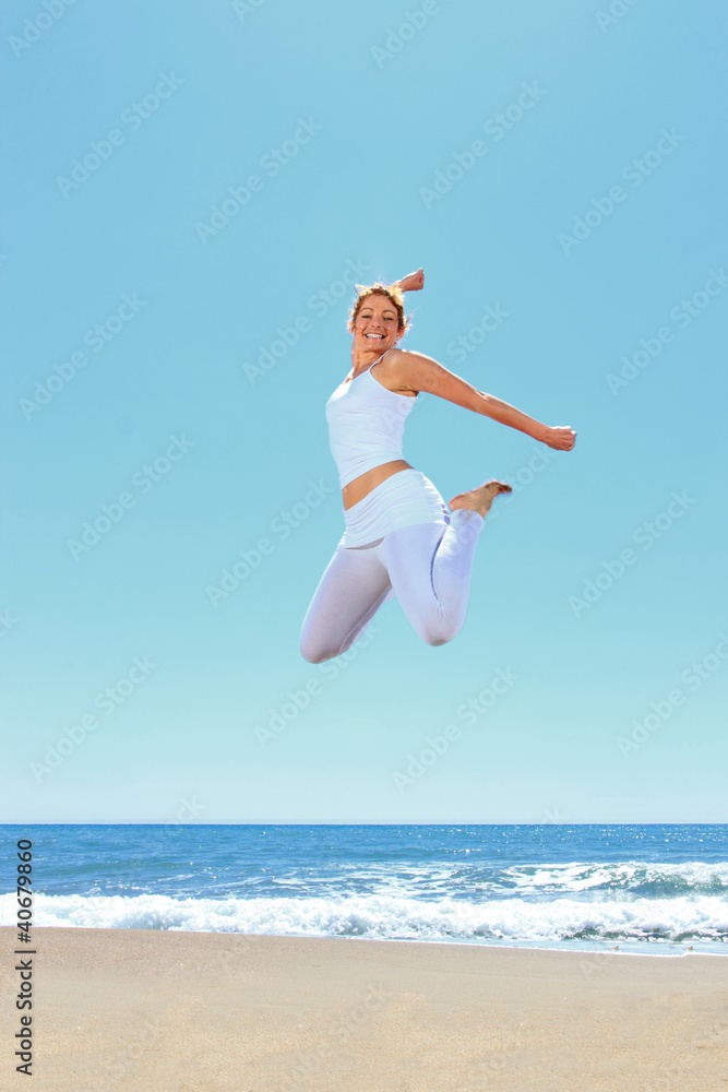 young beautiful woman jumping