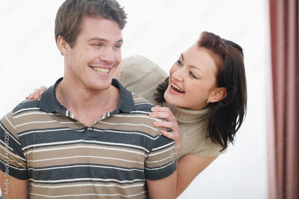 Portrait of smiling young couple having fun Portrait of smiling young couple having fun