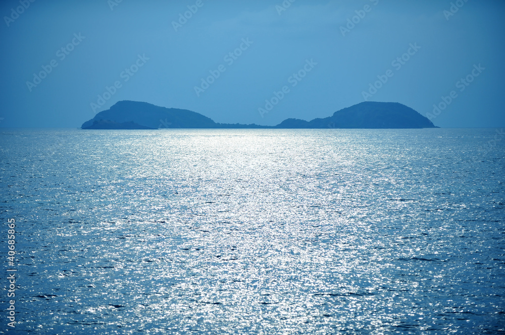 Island in blue ocean