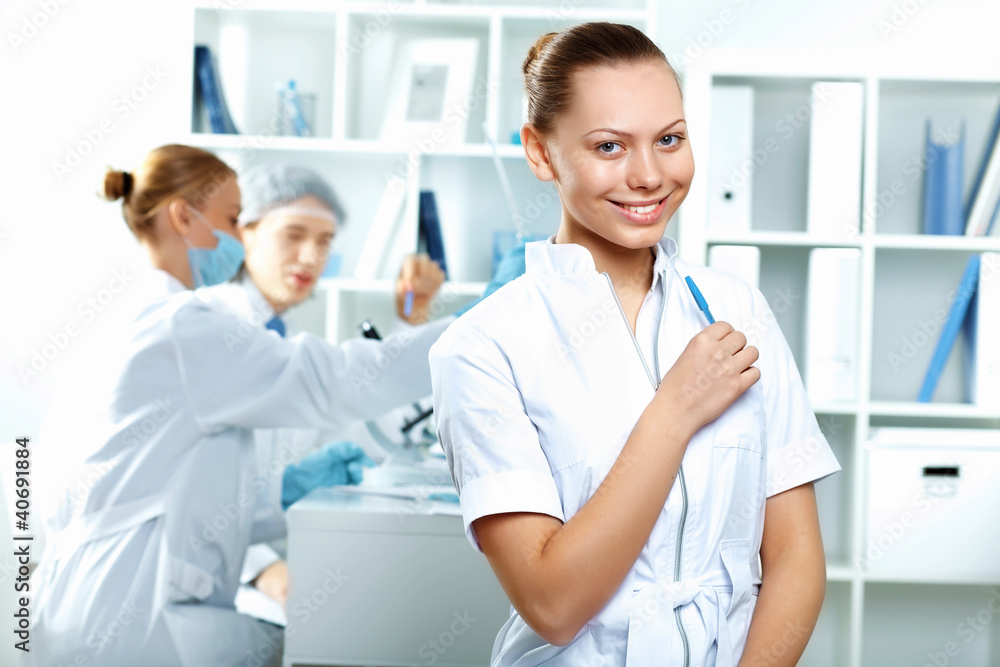 Young scientists working in laboratory Young scientists working in laboratory