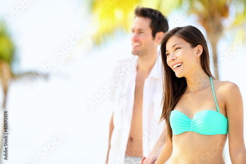 Happy couple on beach vacation © Maridav