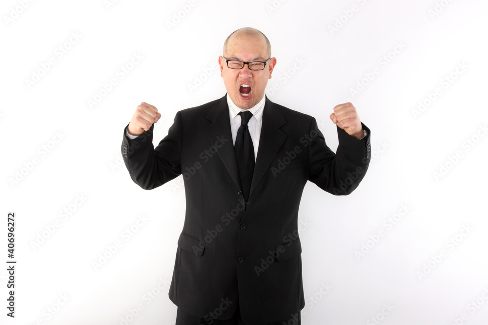 Angry business executive in a suit. Angry business executive in a suit.