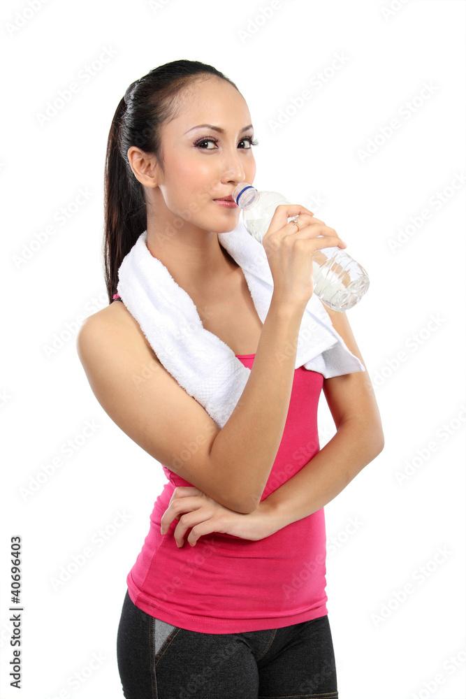 attractive asian smiling woman drinking water attractive asian smiling woman drinking water
