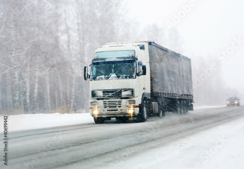 truck goes on winter road