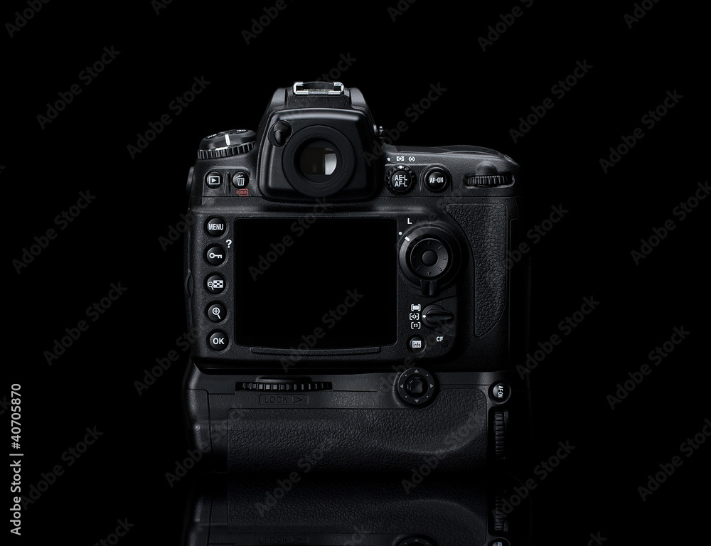 Digital SLR camera isolated on black - obrazy, fototapety, plakaty 