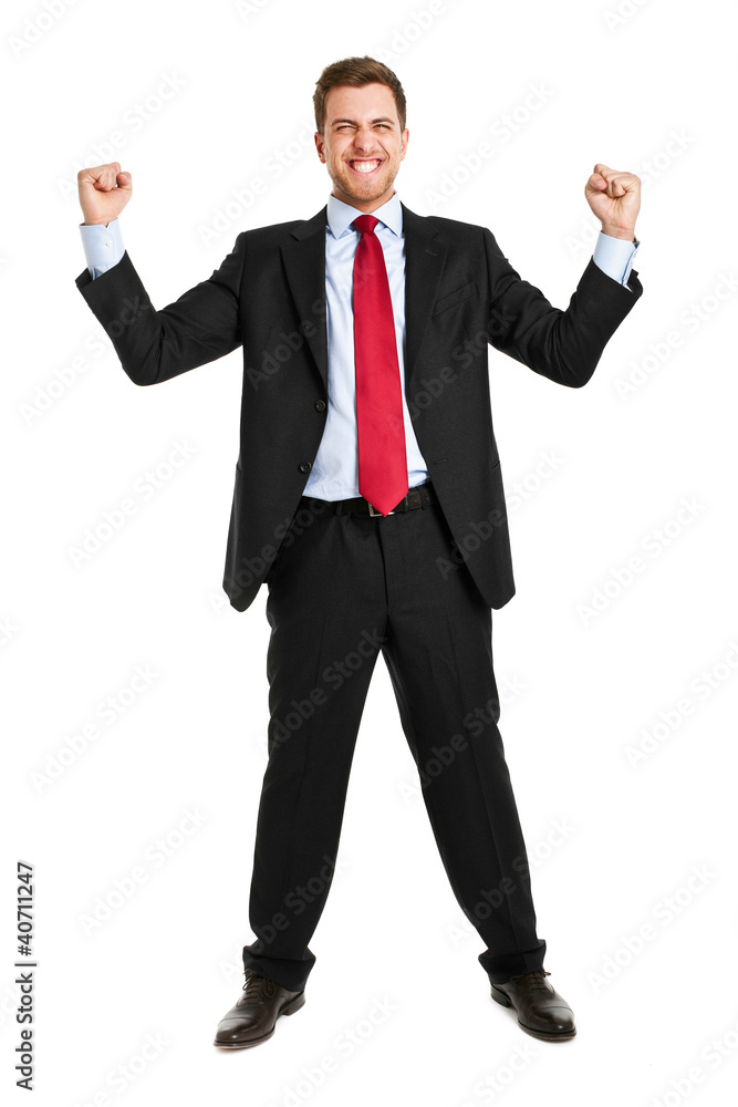 Businessman raising up arms in sign of victory Businessman raising up arms in sign of victory