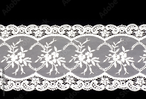 Vintage lace with flowers on black background