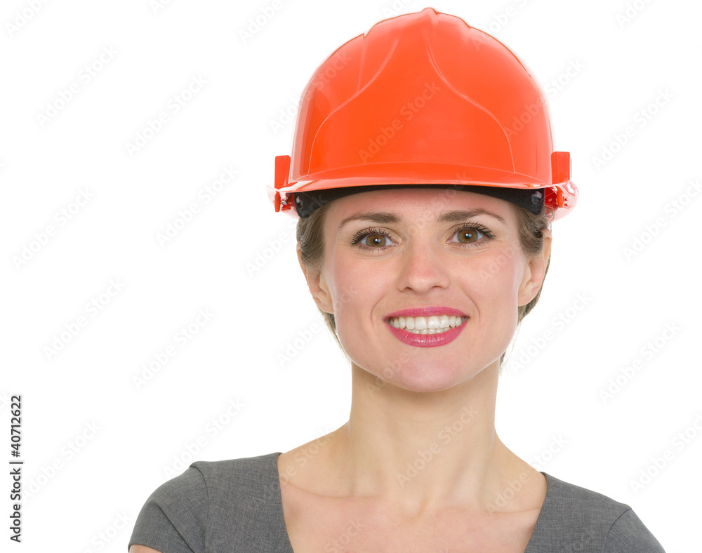 Portrait of smiling architect woman in helmet isolated Portrait of smiling architect woman in helmet isolated