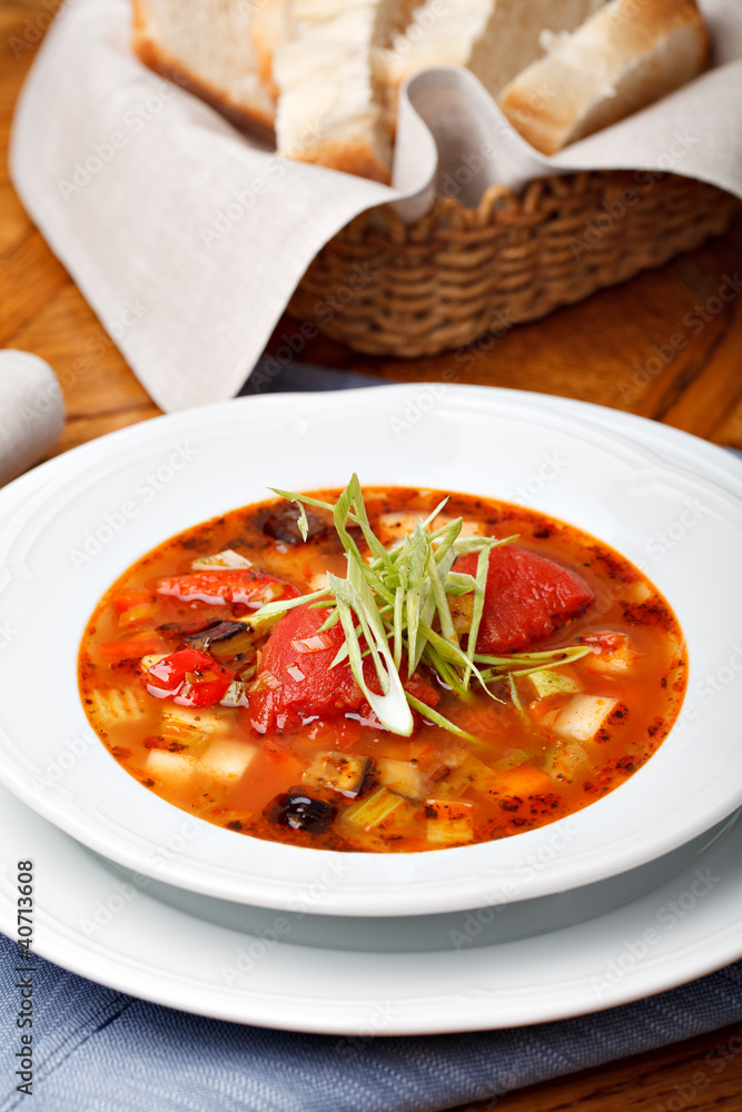 Italian soup served with bread Italian soup served with bread