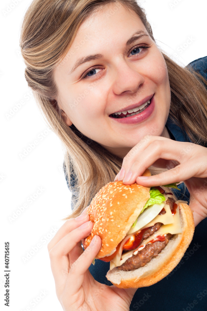Happy beautiful woman with hamburger