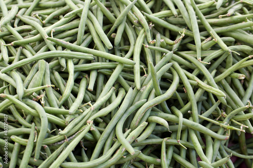 Pile of string beans for sale at a farmers market