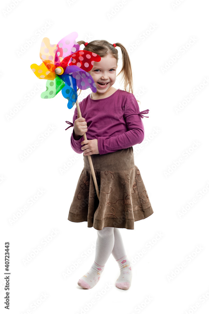 Nice child holding a wind toy Nice child holding a wind toy