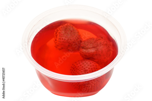 Bright red jelly with strawberries
