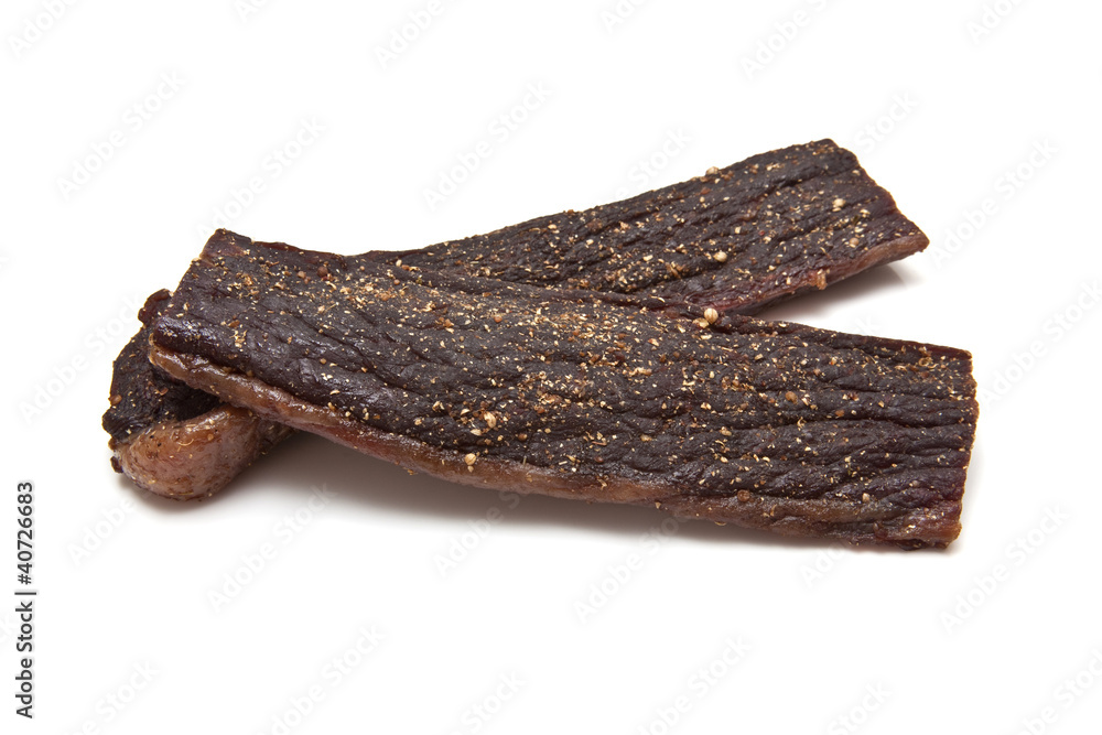 South African biltong (beef) isolated on a white background South African biltong (beef) isolated on a white background