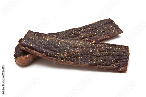 South African biltong (beef) isolated on a white background