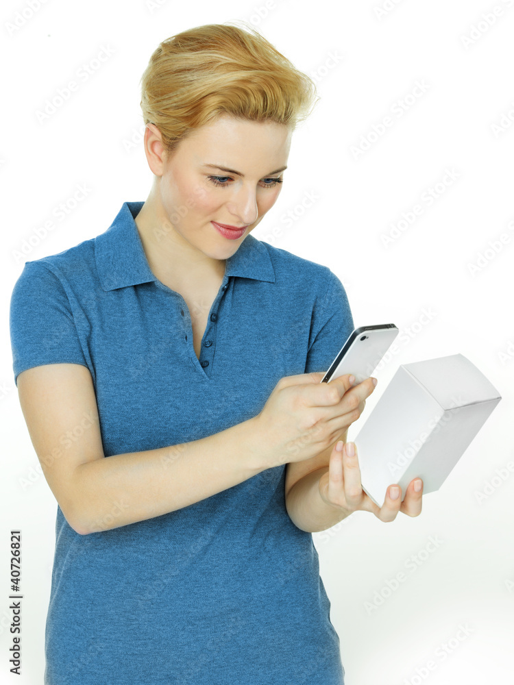Pretty woman scans a scancode with her cellphone Pretty woman scans a scancode with her cellphone