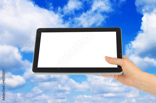 Touch screen device with blue sky in woman hand