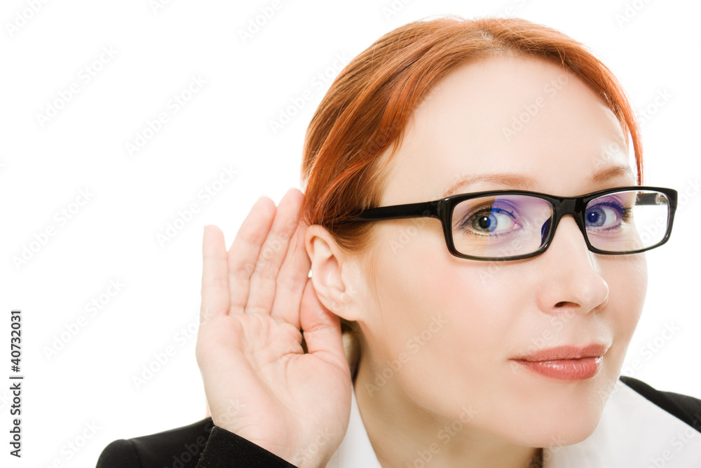 Close up of woman's hand to his ear .