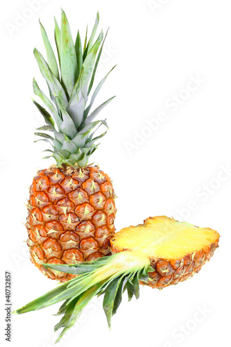 Full and slice of fresh pineapple