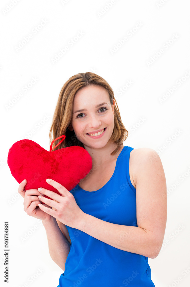 woman holding a red heart woman holding a red heart