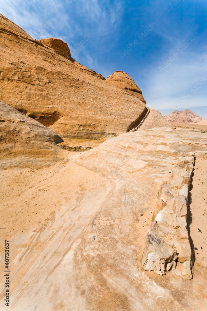 drained water canal in sanstone rocks of Wad iRum dessert drained water canal in sanstone rocks of Wad iRum dessert