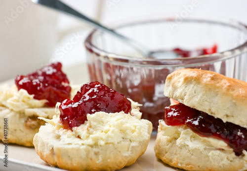Home-baked scones with strawberry jam and clotted cream.