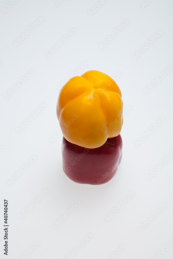 close up of red and yellow peppers close up of red and yellow peppers