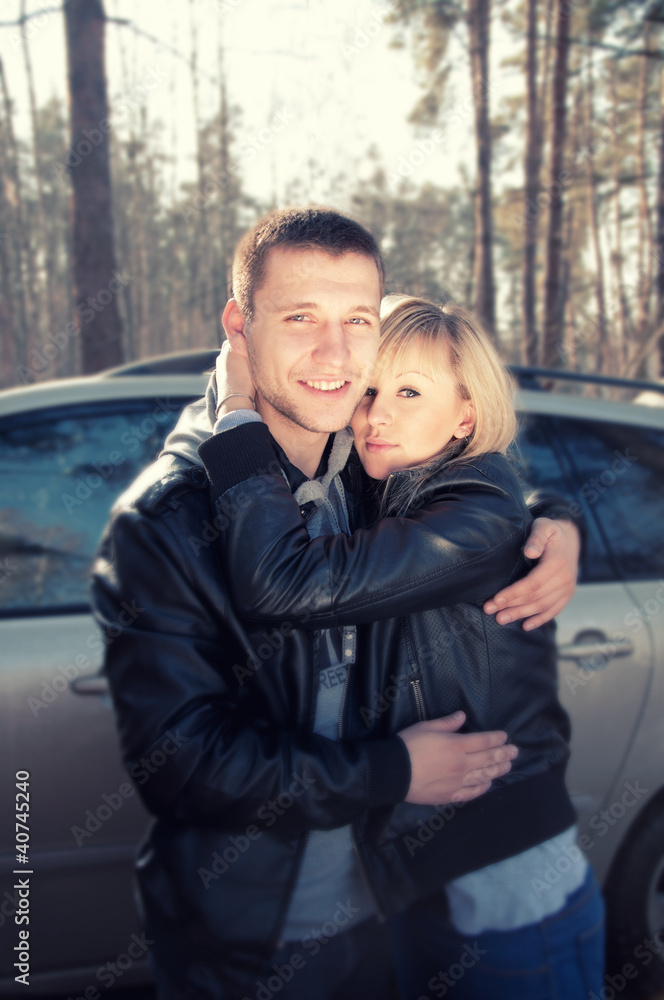 couple hugging outside in the forest couple hugging outside in the forest