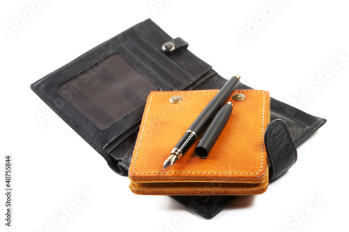 still-life purse and leather organizer with pen isolated