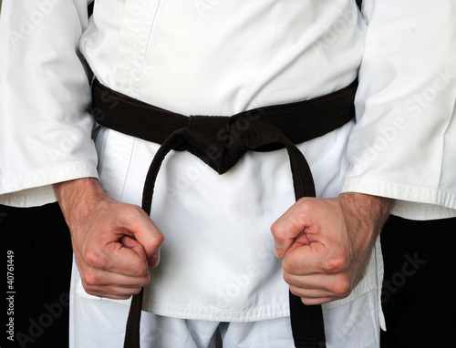 Man in a kimono and belt for martial arts