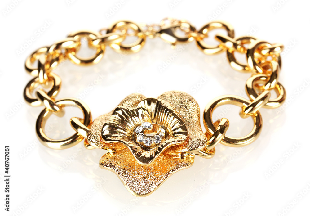 Beautiful golden bracelet with precious stones isolated on white Beautiful golden bracelet with precious stones isolated on white