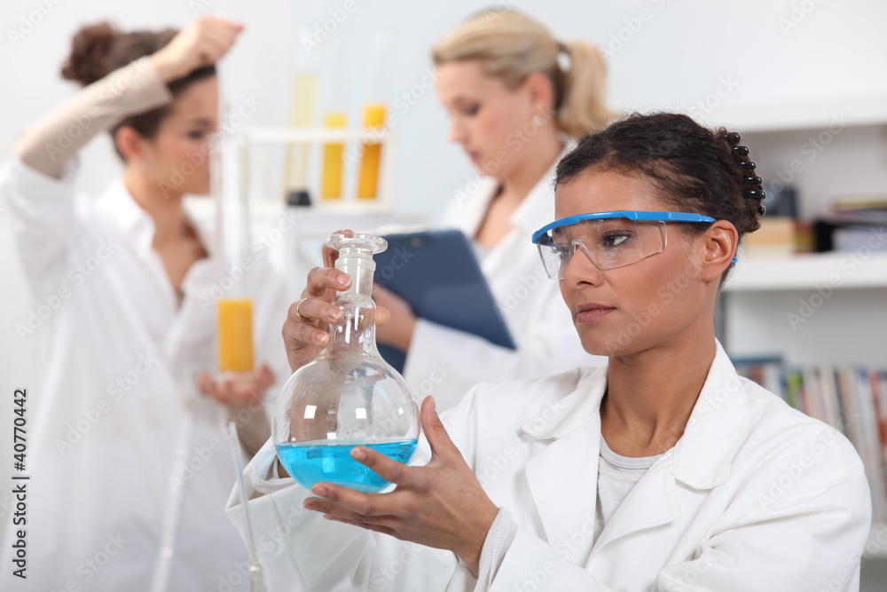 Women working in a laboratory Women working in a laboratory