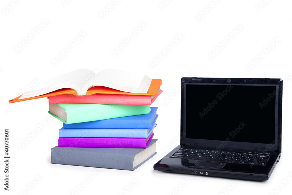 Isolated Stack of books and laptop Isolated Stack of books and laptop