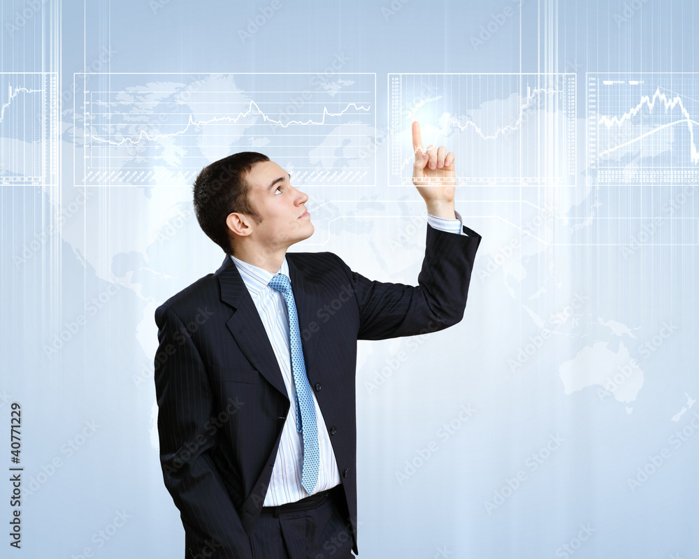 Businessman against technology background Businessman against technology background