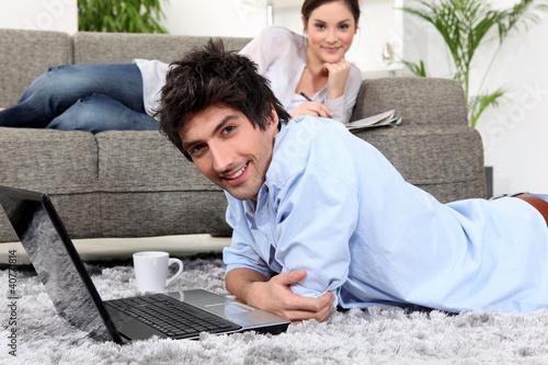 Couple relaxing at home