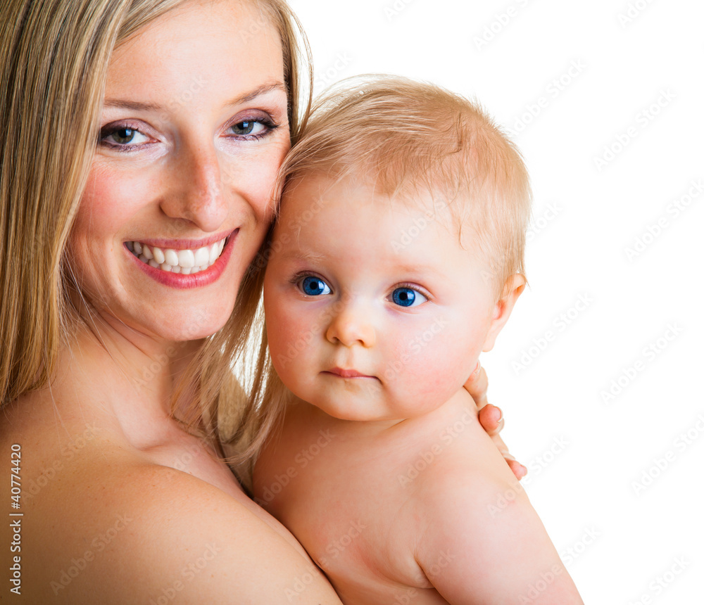 Mother holding cute infant girl isolated on white Mother holding cute infant girl isolated on white