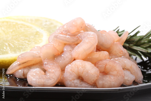 Pile of shrimps over a black dish