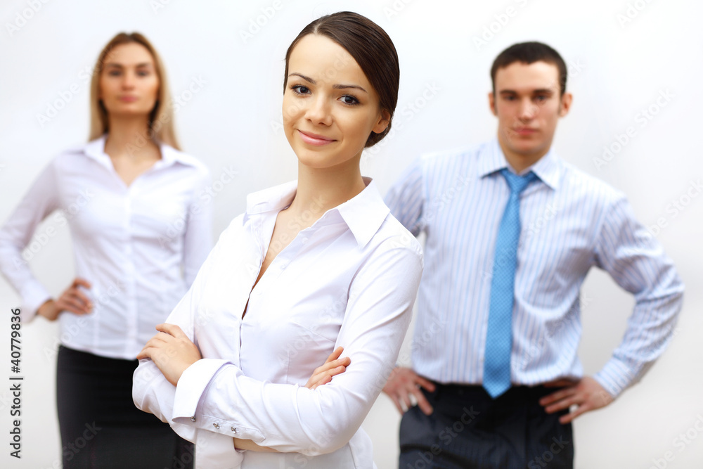 three successful young business persons together three successful young business persons together