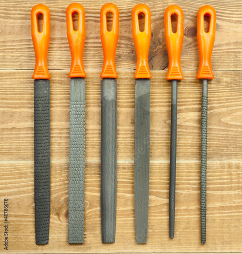 A set of rasp on a wooden background photo