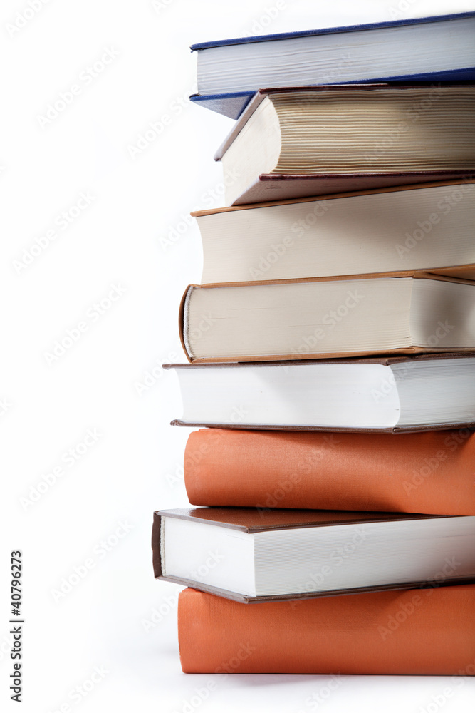 A stack of books on a white background. A stack of books on a white background.